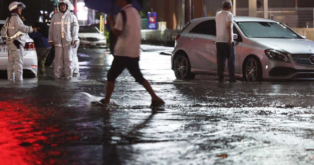 Heavy rain causes flooding near Tokyo that kills 4 and disrupts train and air travel