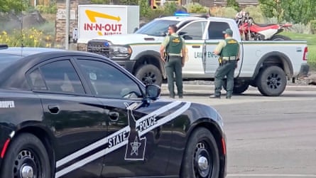 Police at the In-N-Out restaurant, which recently opened on 24 July