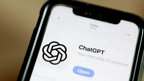 EPA/Shutterstock The ChatGPT logo on a phone screen.
