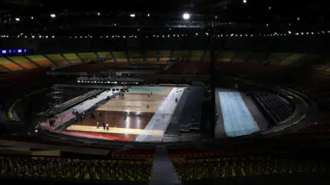 Reuters Workers prepare badminton courts for the upcoming BWF World Championships inside the Indira Gandhi Indoor Stadium in New Delhi, India, August 10, 2026.