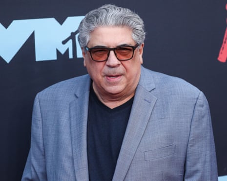 Man in suit on red carpet
