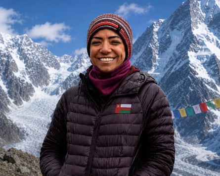 Nadhira Alharthy with mountains in the background