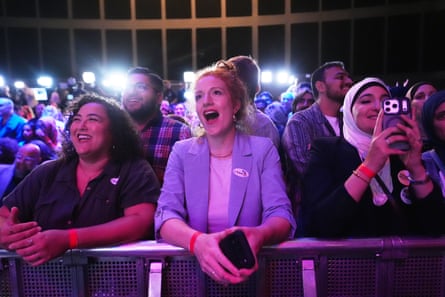 Attendees wait for election results during a primary election night event for Abdul El-Sayed in Detroit.
