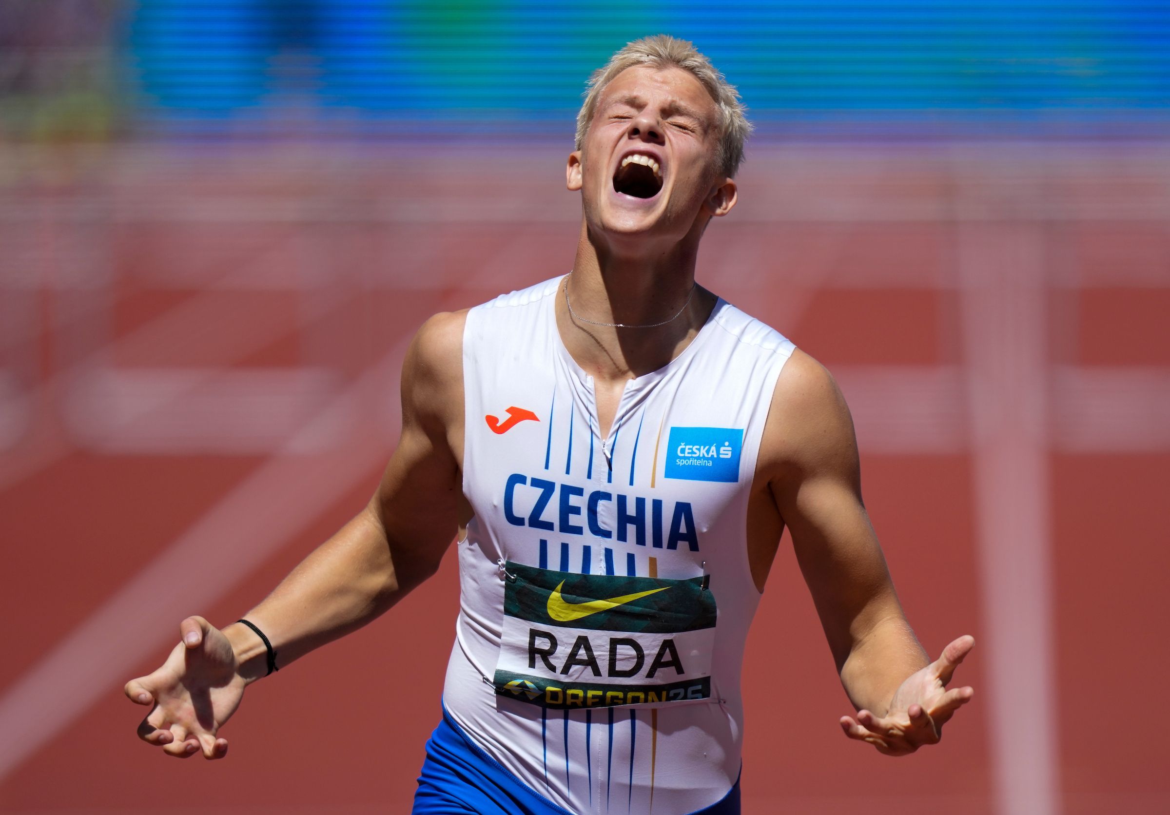 Michal Rada celebrates his 400m hurdles win in Oregon