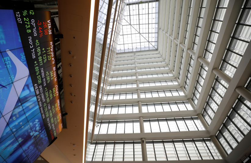 Part of an electronic board displaying market data is seen at the Tel Aviv Stock Exchange.