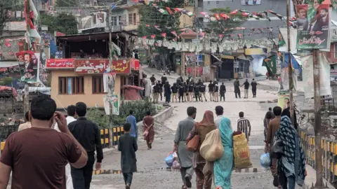 EPA Security forces patrol during clashes in Muzaffarabad, Pakistan-administered Kashmir, 31 July 2026