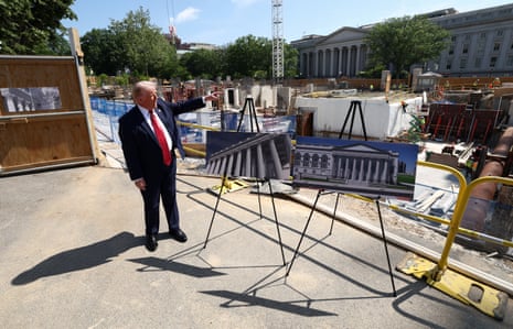 a man speaks next to a construction site