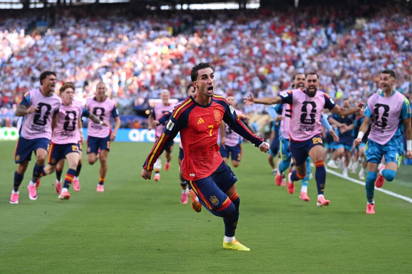 Spain's Ferran Torres celebrates scoring his team's sole goal the FIFA World Cup final against Argentina on Sunday.