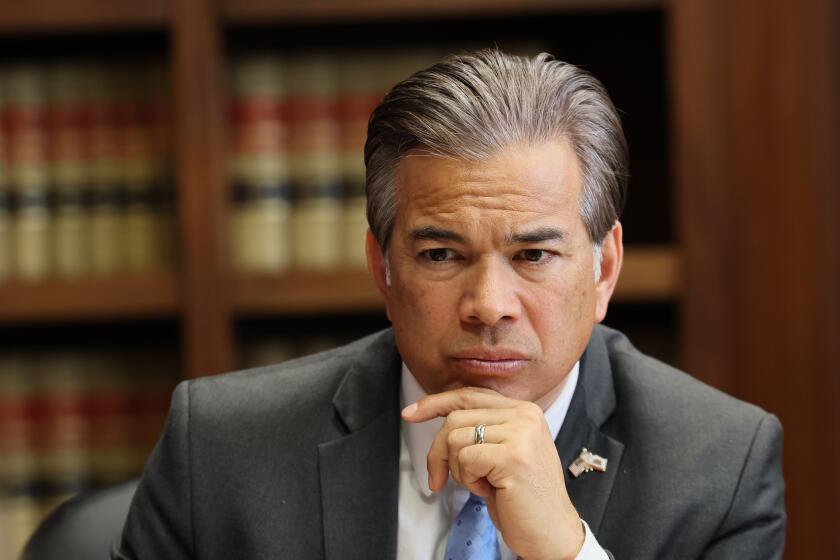 Los Angeles, CA - March 11: California Atty. Gen. Rob Bonta is briefed by members of his Civil Rights Enforcement Section on litigation challenging the Trump administration. Photo taken at Attorney General's DTLA office in Los Angeles Tuesday, March 11, 2025. (Allen J. Schaben / Los Angeles Times)