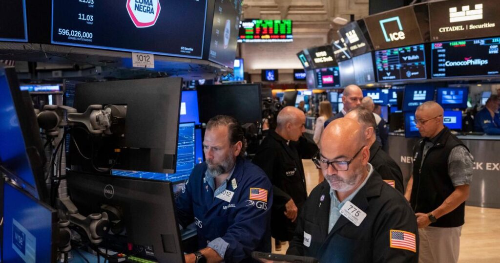 Wall Street rises near a record as AI stocks climb and worries about inflation ease