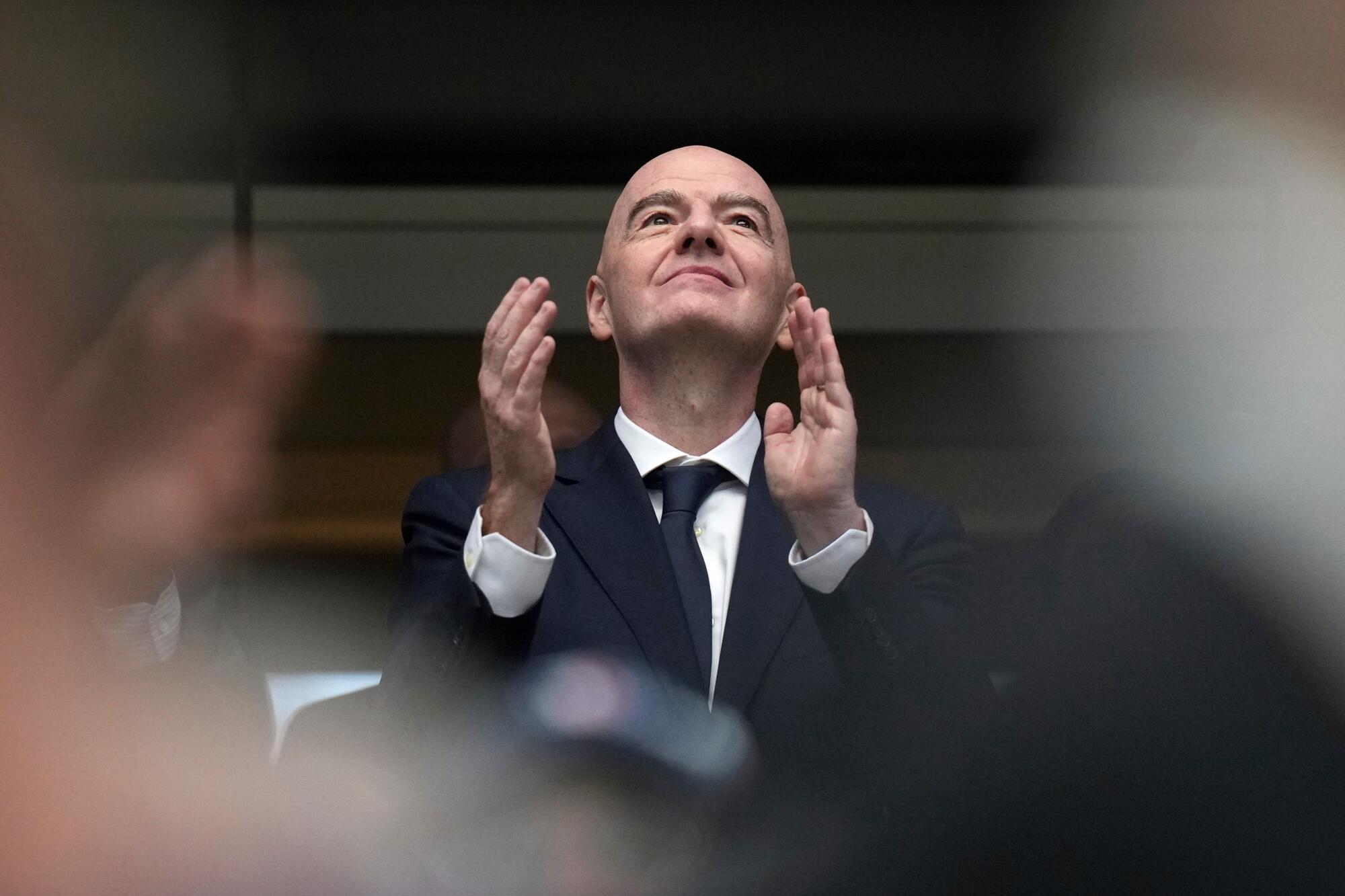 FIFA president Gianni Infantino claps during a World Cup semifinal match between France and Spain.