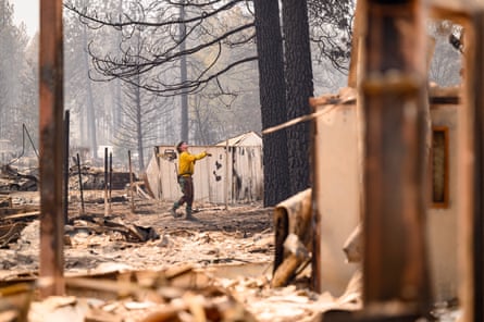 Burnt church with firefighter