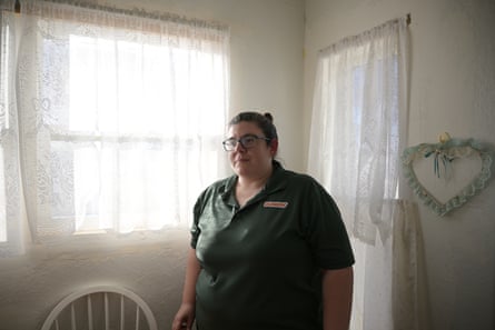 A looks pensive woman by a window