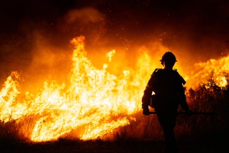Silhouette of firefighter and fire
