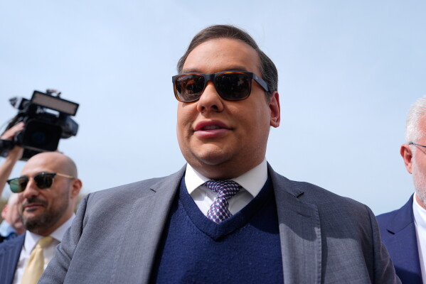 Former Rep. George Santos arrives at federal court for sentencing, April 25, 2025, in Central Islip, N.Y. (AP Photo/Julia Demaree Nikhinson, File)