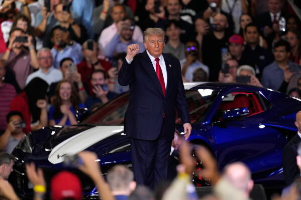 President Donald Trump arrives to speak at an event at the General Motors Proving Ground Monday, July 27, 2026, in Milford, Mich. (AP Photo/Paul Sancya)