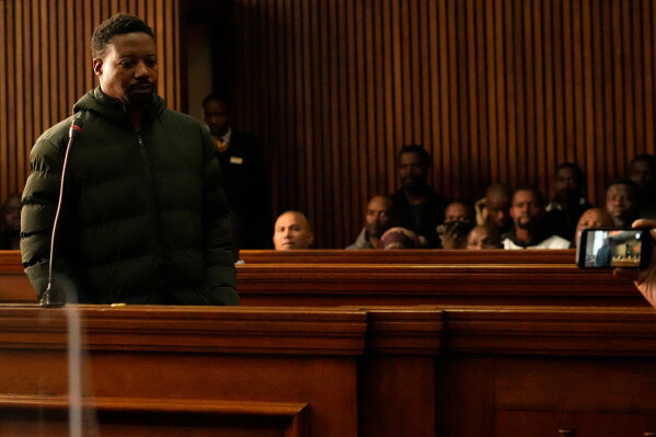 Ndodana Mkhanyisi Tshuma, a British citizen of Zimbabwean origin, appears in a court in Johannesburg, South Africa, Monday, July 13, 2026. (AP Photo/Themba Hadebe)