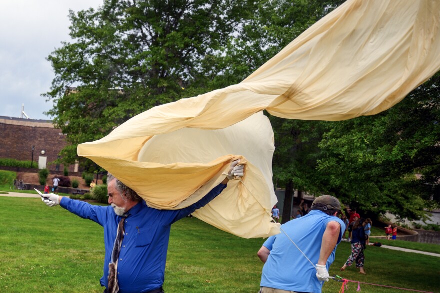 WEST HARTFORD, CONNECTICUT - JULY 17:: University of Bridgeport professor Nicolas Zoghb stands firm after using a knife to pierce and deflate a high-altitude balloon at the University of Hartford, July 17, 2026. University of Bridgeport students and faculty, alongside students and faculty from the University of Hartford, ran the test in preparation for a NASA-supported solar eclipse research mission during the August 12 eclipse in Burgos, Spain.