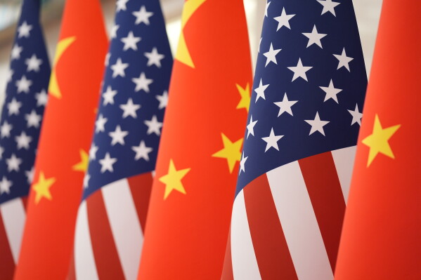 The U.S. and Chinese flag at the Great Hall of the People prior to the state dinner of President Donald Trump and Chinese President Xi Jinping on May 14, 2026, in Beijing. (AP Photo/Mark Schiefelbein, File)