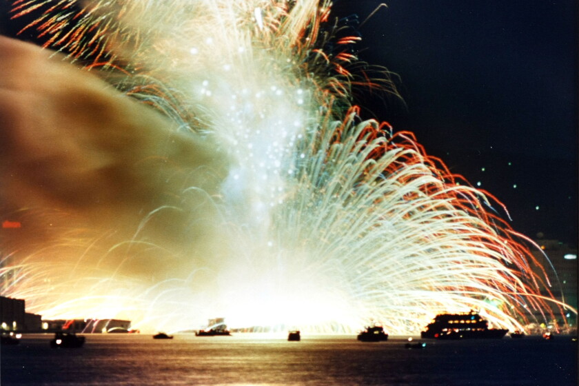 Sparks fly as a massive explosion is triggered during the city fireworks display on the Duluth waterfront on July 4, 1988. Photo by Don Gustafson.