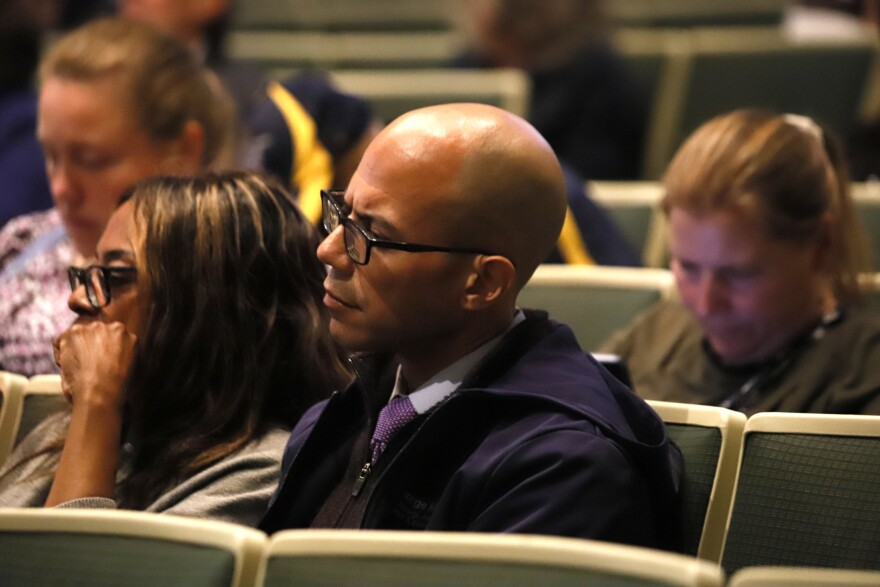 Anchorage Assembly member George Martinez sits in the Assembly chambers on Aug. 4, 2026 as members debate a resolution that would prompt an investigation into his travel to New York in 2024.