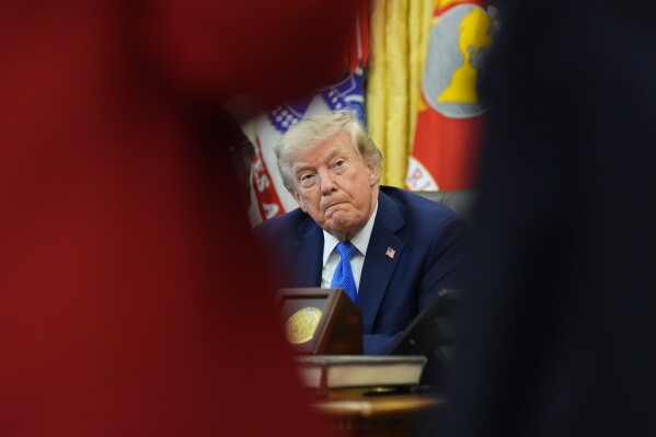 President Donald Trump speaks in the Oval Office of the White House, Thursday, Aug. 6, 2026, in Washington. (AP Photo/Alex Brandon)