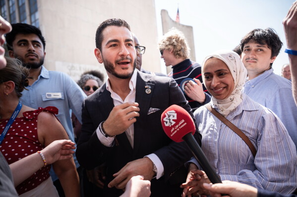 Abdul El-Sayed departs following a news conference at the Spirit of Detroit shortly after winning the Democratic nomination for U.S. Senate in Michigan, Wednesday, Aug. 5, 2026, in Detroit. (AP Photo/Julia Demaree Nikhinson)