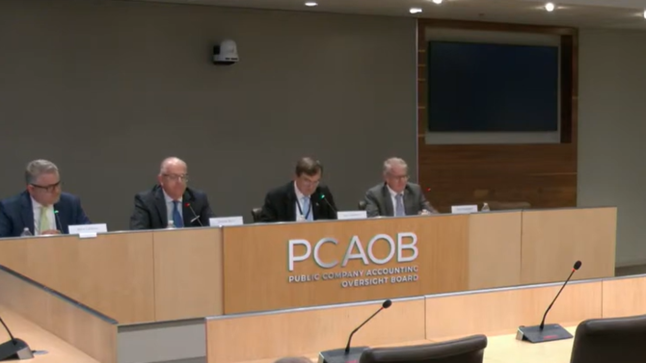 PCAOB board members (left to right) Mark Calabria, George Botic, chairman Demetrios "Jim" Logothetis and Steven Laughton at an open meeting