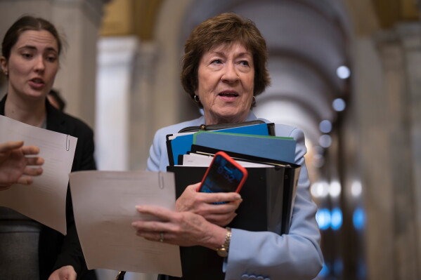 Sen. Susan Collins, R-Maine, a member of the Senate Intelligence Committee, arrives at the Capitol after President Donald Trump said he was delaying Jay Clayton's nomination to lead the U.S. intelligence community, in Washington, Wednesday, June 17, 2026. (AP Photo/J. Scott Applewhite)