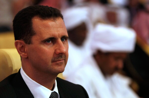 Syrian President Bashar Assad, attends the closing session of the Arab Summit in Doha, Qatar, March 30, 2009. in Doha, Qatar. (AP Photo/Hassan Ammar, file)