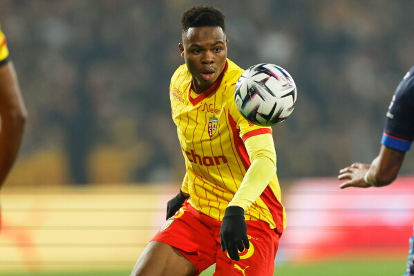 Lens' Mamadou Sangare in action during the French League One soccer match between Lens and Auxerre in Lens, France, Saturday, Jan. 17, 2026. (AP Photo/Jean-Francois Badias, File)