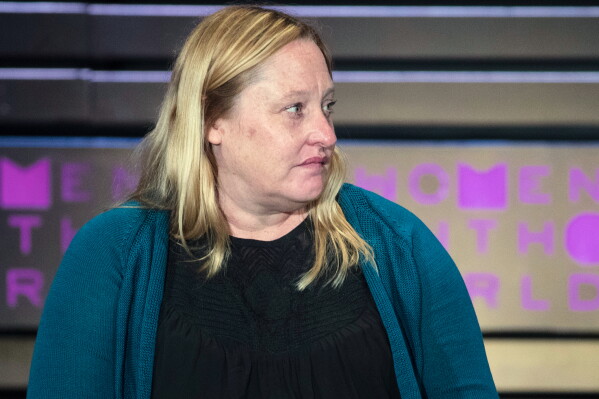 Heidi Beirich, of the Southern Poverty Law Center, speaks during the Women in the World Summit at Lincoln Center in New York, April 6, 2017. (AP Photo/Mary Altaffer, File)