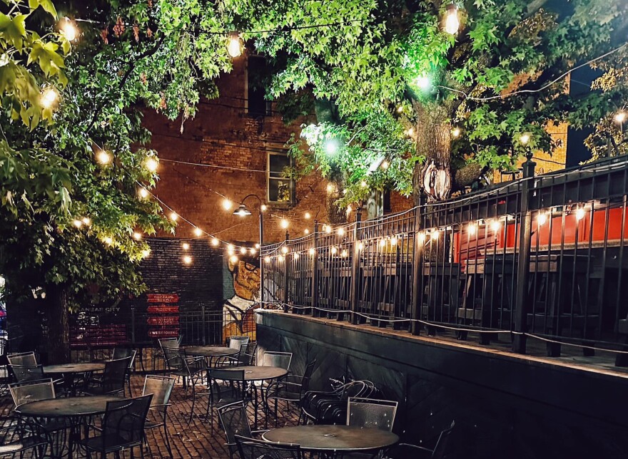 An exterior view of Harry's Bar and Tables.