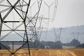 Power lines cross a farm near Frederick, Md.