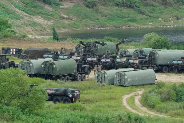 U.S. Army's armored vehicles gather to cross a river at a training field in Yeoncheon, South Korea, near the border with North Korea, Monday, Aug. 17, 2026. (AP Photo/Ahn Young-joon)