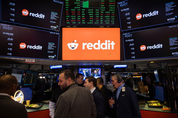 Reddit Inc. logos are displayed on the New York Stock Exchange trading floor, prior to the company's IPO, Thursday, March. 21, 2024. (AP Photo/Yuki Iwamura, File)
