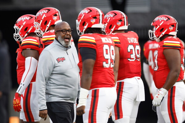 Maryland head coach Mike Locksley encourages his players before an NCAA football game against Northern Illinois, Sept. 5, 2025, in College Park, Md. (AP Photo/Mike Buscher, File)