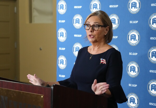 U.S. Sen. Darline Graham, R-S.C., speaks with reporters after a debate with U.S. Rep. Ralph Norman, R-S.C., ahead of the special GOP Senate runoff election to replace the late Sen. Lindsey Graham, R-S.C., on Tuesday, Aug. 18, 2026, in Newberry, S.C. (AP Photo/Meg Kinnard)