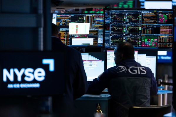 Specialist Dilip Patel works on the floor of the New York Stock Exchange, Monday, Aug. 17, 2026, in New York. (AP Photo/Yuki Iwamura)