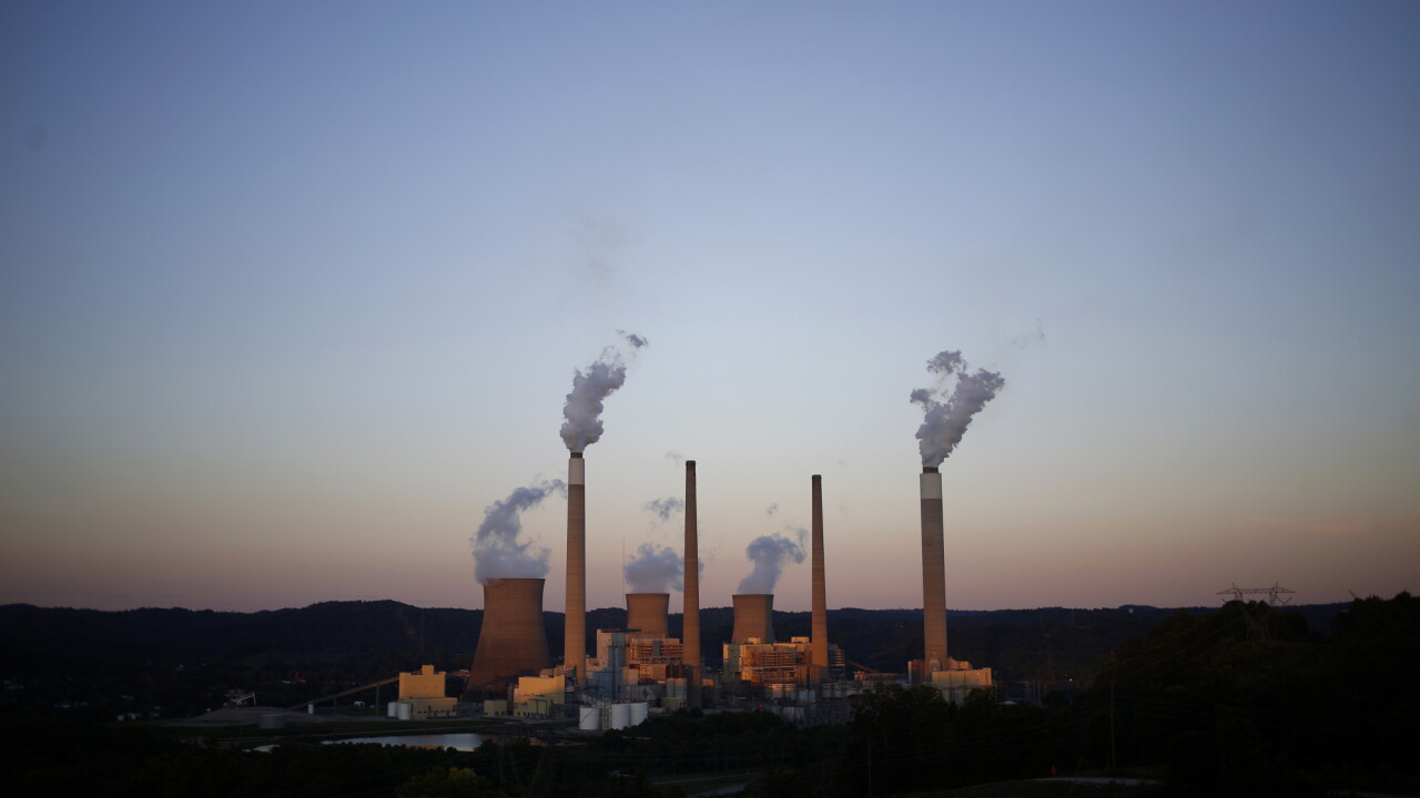 Emissions rise from the American Electric Power Co. coal-fired John E. Amos Power Plant in Winfield, West Virginia.