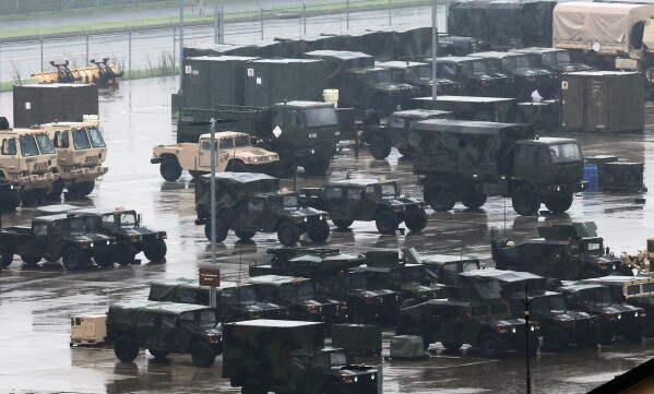U.S. military vehicles are parked at Camp Humphreys in Pyeongtaek, South Korea, Friday, Aug. 21, 2026. (Hong Ki-won/Yonhap via AP)