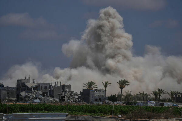 The Israeli army demolishes buildings east of Deir al-Balah, central Gaza Strip, Saturday Aug. 22, 2026. (AP Photo/Abdel Kareem Hana)