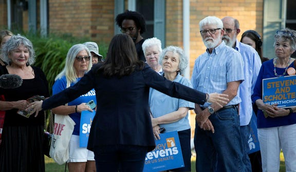 U.S. Rep. Haley Stevens speaks with supporters at a canvass launch on July 29, 2026 in Okemos, Michigan. The people pictured are not affiliated with the story.