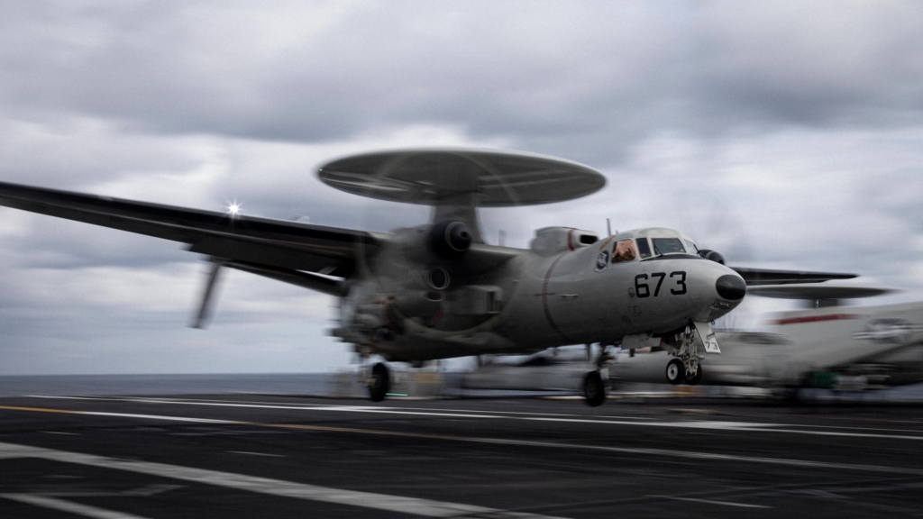 Title E-2D Hawkeye landing on the USS Gerald R. Ford aircraft carrier