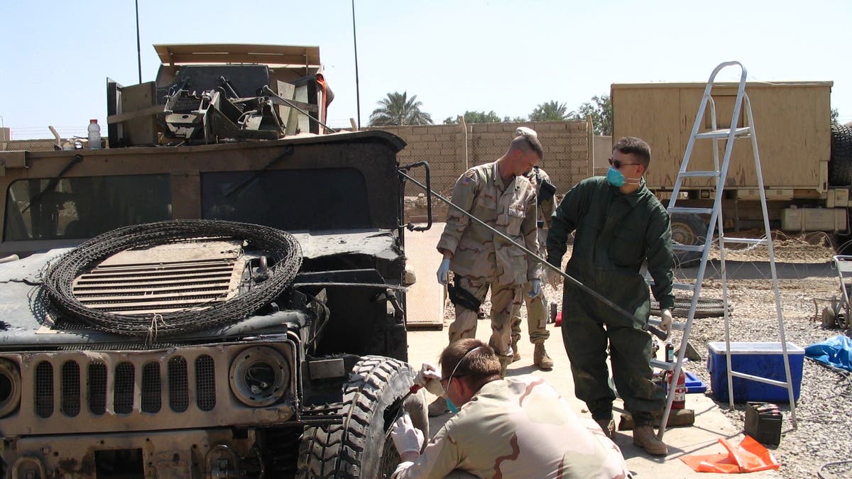 A vehicle after it was struck by an explosive device in Iraq