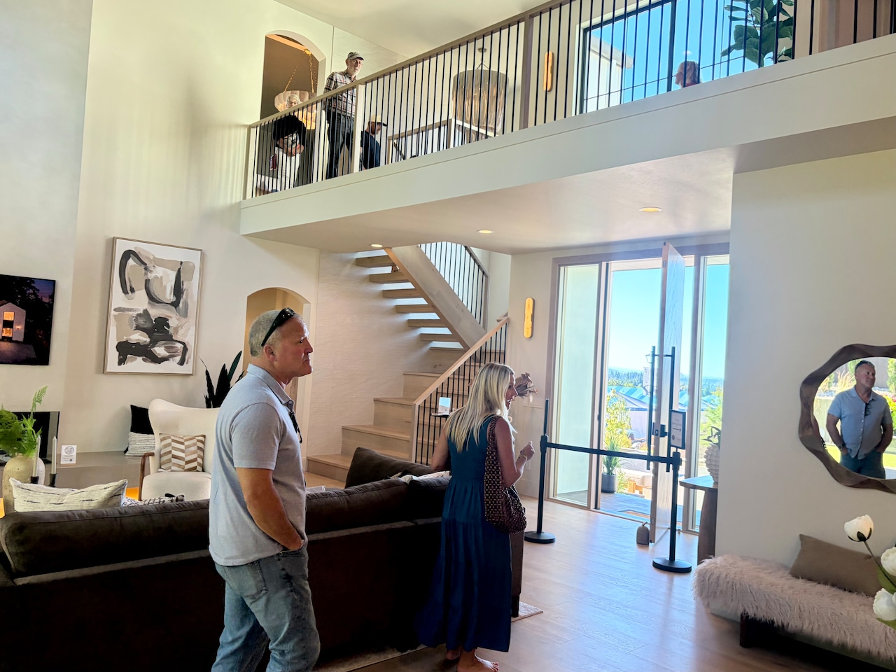 There are real estate photos of this house. Devin Dougherty, owner of Designer Built Homes, designed and built a 3,875-square-foot modern-organic styled house named the Atelier to reflect its craftsmanship and carefully considered details.
The open kitchen features a 5-foot-long workstation sink with two faucets, allowing home cooks to work side-by-side. When cutting boards cover the sink, the space transforms into a serving area. Dougherty envisions casual taco bars or party charcuterie spreads.
There is a putting green and barrel sauna in the backyard along with an outdoor kitchen
2026 NW Natural Street of Dreams runs July 30-Aug. 23, with people able to tour seven high-end residences in a range of architectural styles at the main venue in the Serres Farms development in Oregon City.