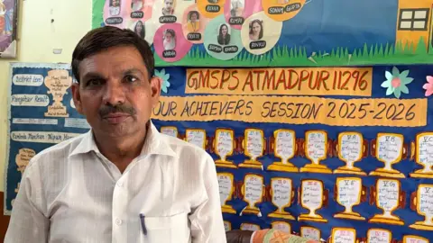 Geeta Pandey/BBC Chatar Singh is the headmaster of a primary school in Faridabad's Atmadpur village