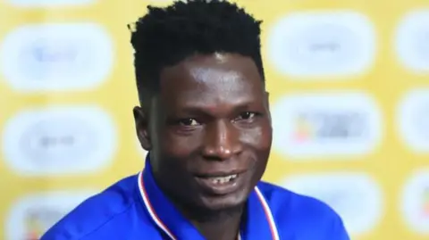 SC Villa A close-up of David Owori at a press conference