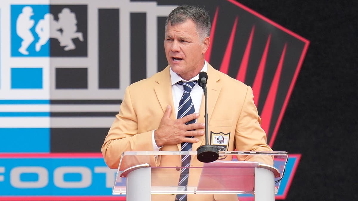 Adam Vinatieri speaks during his Pro Football Hall of Fame induction ceremony in Canton, Ohio.