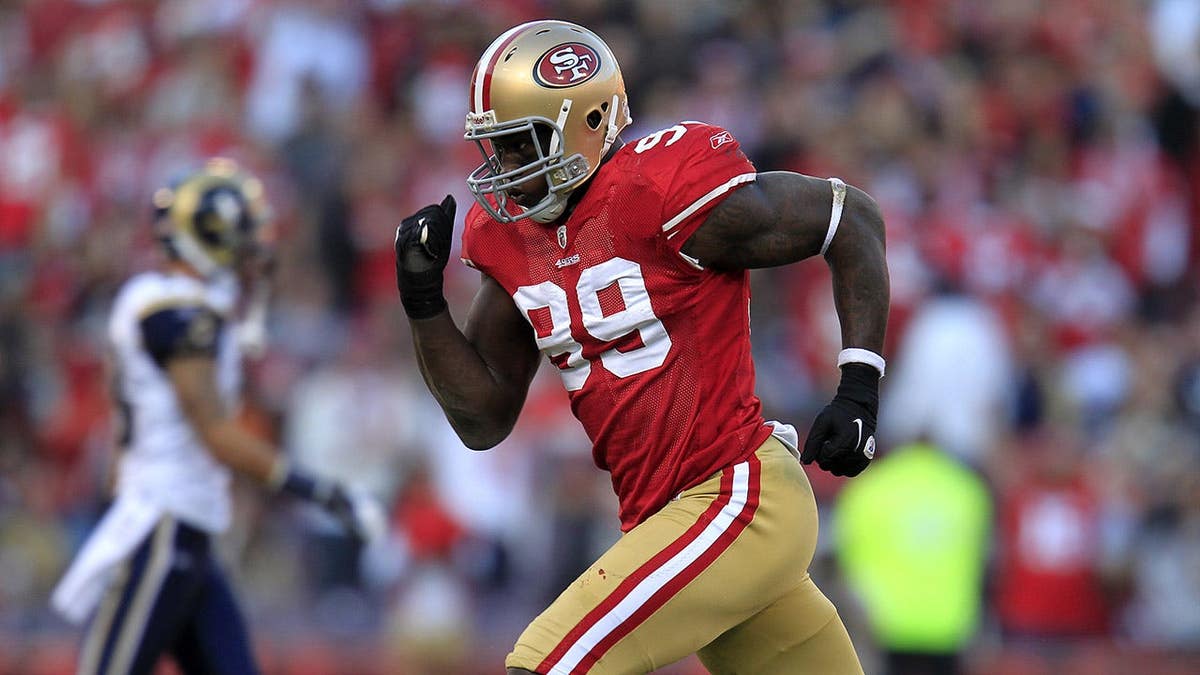 San Francisco 49ers Aldon Smith running off the field after sacking St. Louis Rams quarterback A.J. Feeley at Candlestick Park